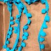 Pompom band helblauw p/mtr bolletjesband groot 