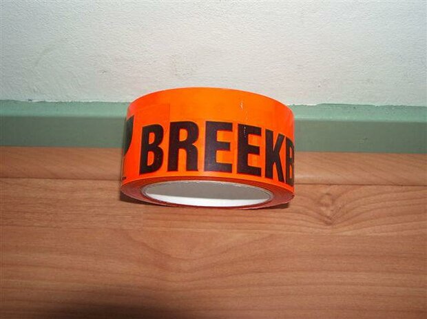 Tape PVC breekbaar/fragile 50mm p/66mtr oranje dozentape