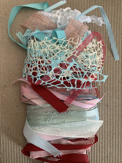 Lintenset creme/rood/roze 50cm p/24st